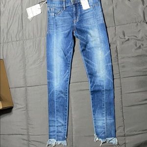 Dark wash paneled low rise skinny jeans